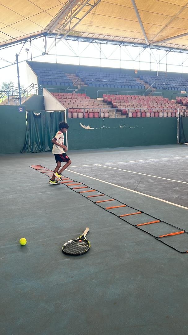 On-court footwork practice using an agility ladder